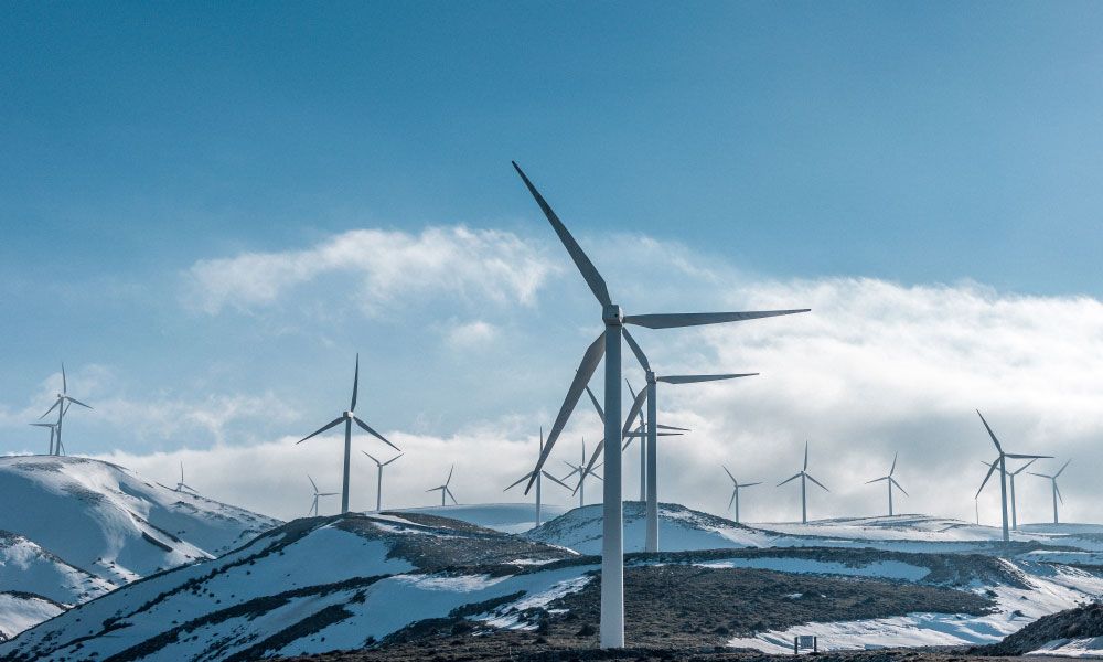 Wind turbines in a snowy landscape